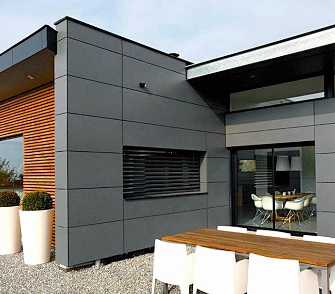 Fachada de diseño moderno revestida con panel sándwich arquitectónico instalado por Europa 9.